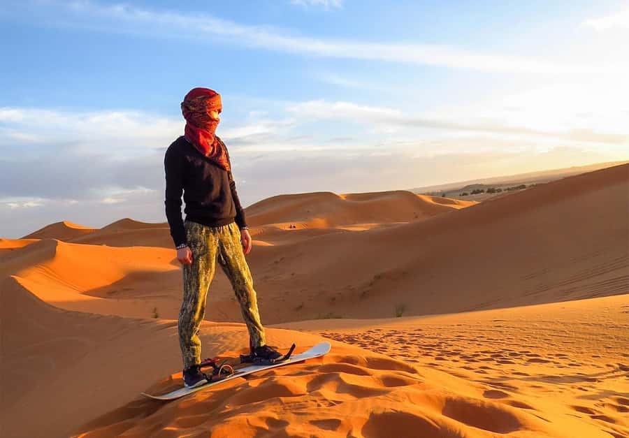 Dubai: Desert Safari, Camel Ride, Sandboard & Buffet Dinner - A short camel ride with a cultural purpose