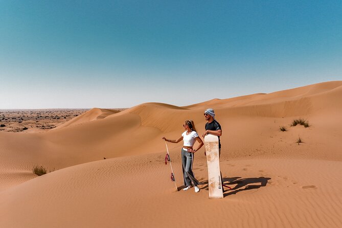 Dubai Desert Safari: Camel Ride, Sandboarding, BBQ & House Drinks - The reserve, falcons, and a desert sunset
