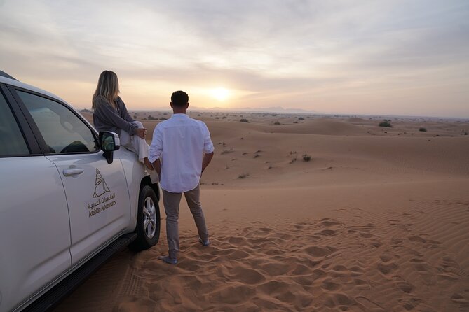 Dubai Desert Safari: Camel Ride, Sandboarding, BBQ & House Drinks - What the $123 price really covers