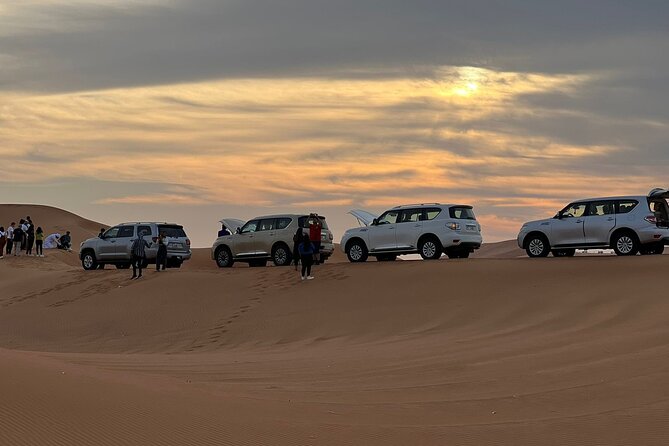 Dubai Desert Safari, Camel Ride, Shisha, Henna, Live BBQ & Shows - Dune bashing, sandboarding, and the first desert stop