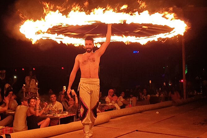 Dubai: Desert Safari, Camel Ride, Show & Optional Dinner - Sandboarding for about 15 minutes
