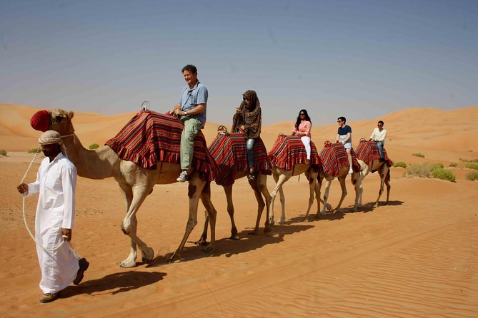 Dubai: Desert Safari, Camel Ride, Show & Optional Dinner - Dinner, tea, and the package choice