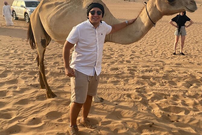 Dubai Desert Safari: Premium Adventure ,Camel Riding & Live Shows - Sandboarding gives you a short burst of desert sport