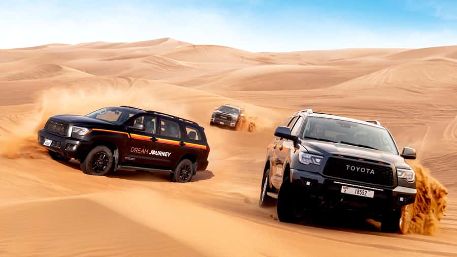 Dubai Desert Safari - Premium BBQ Dinner, Camel Ride & Shows - Tanoura, Fire, and Belly Dance