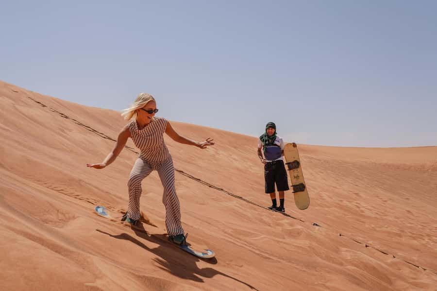 Dubai: Desert Safari, Quad Bike, Camel Ride & Al Khayma Camp - Red Dunes dune bashing and sandboarding