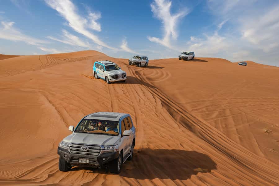 Dubai: Desert Safari, Quad Bike, Camel Ride & Al Khayma Camp - Quad biking at Lahbab