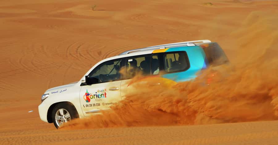 Dubai Desert Safari, Quad Biking, Camel Ride, & Sandboarding - Why Lahbab makes a better desert setting