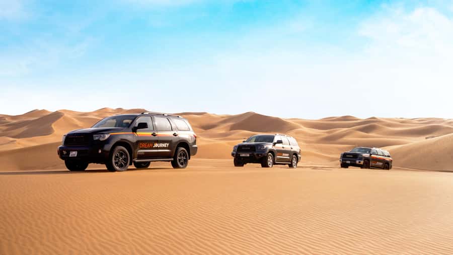 Dubai Desert Safari - Sandboarding, Quad Bike & BBQ Options - From Dubai hotels to Lahbab’s red dunes