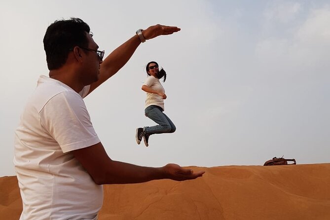 Dubai Desert Safari: Tanoura Show, Dune Bashing and BBQ Dinner - From Dubai streets to open sand