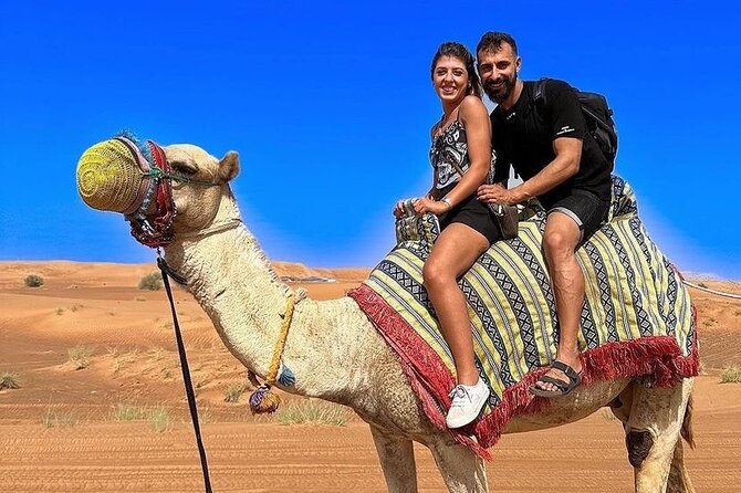 Dubai Desert Safari with Adventure Quad Bike and Buggy Ride - A camel ride offers a slower look at the desert
