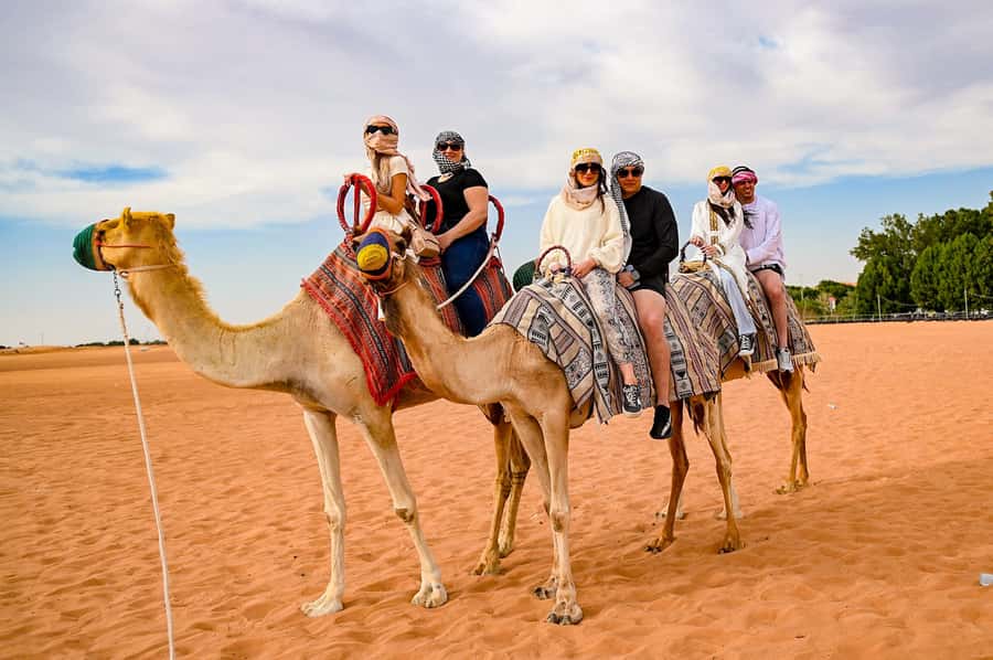 Dubai: Desert Safari with BBQ Dinner & Quad Biking Options - Sandboarding and the first dune photo stop
