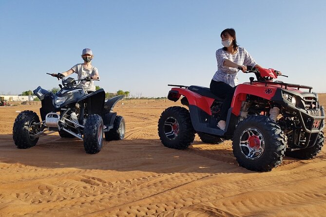 Dubai Desert Safari With BBQ, Quad Bike And Camel Ride - Quad biking, sandboarding, and camel time