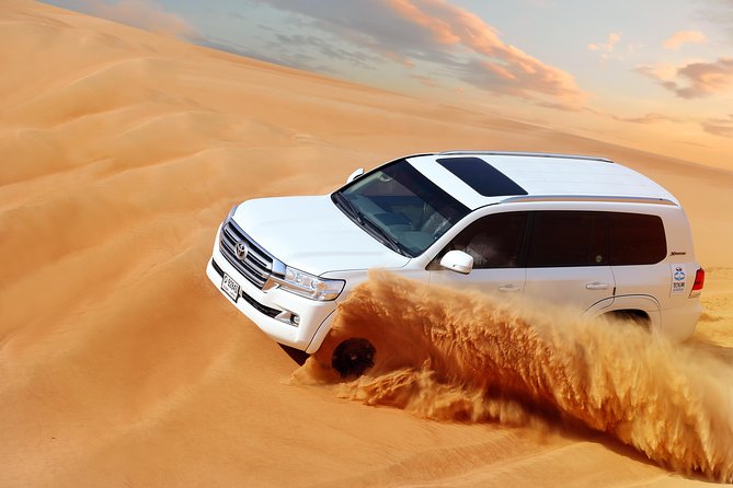 Dubai Desert Safari with Desert Camp Dinner, Camel Ride & Shows - Arriving at Caravanserai Desert Camp