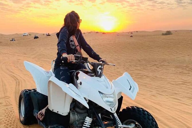 Dubai Dunes Safari With Quad Bike, Camel Ride, BBQ Dinner & Live Shows - Sandboarding adds a simple, good-natured challenge