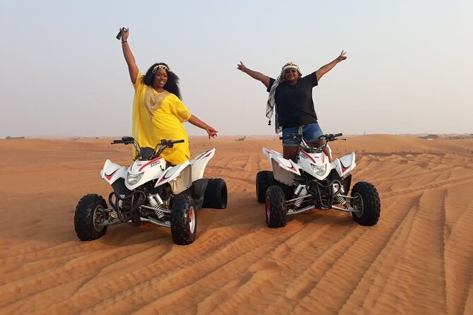 Dubai Dunes Safari With Quad Bike, Camel Ride, BBQ Dinner & Live Shows - Camel riding is brief but well placed at sunset