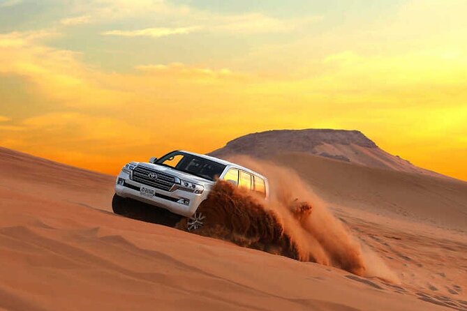 Dubai Dunes Safari With Quad Bike, Camel Ride, BBQ Dinner & Live Shows - Dune bashing is the main adrenaline hit