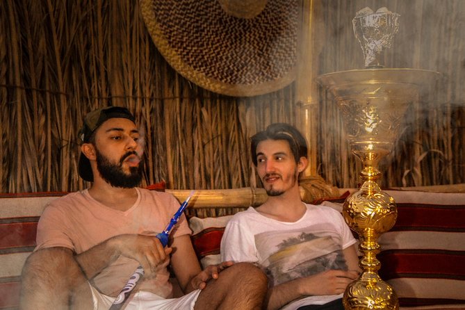 Dubai Evening Desert Safari, Camel Ride, Sandboarding & BBQ Dinner - Henna, shisha and traditional camp activities