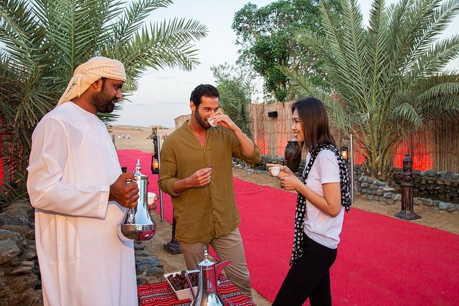Dubai Evening Desert Safari: Sandboarding, BBQ, Camel Ride & more - BBQ dinner and evening entertainment