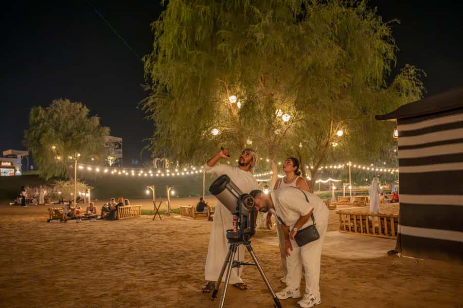 Dubai: Evening Desert Safari with Camel Ride & Stargazing - Red Dunes, sunset light, and the 4x4 ride