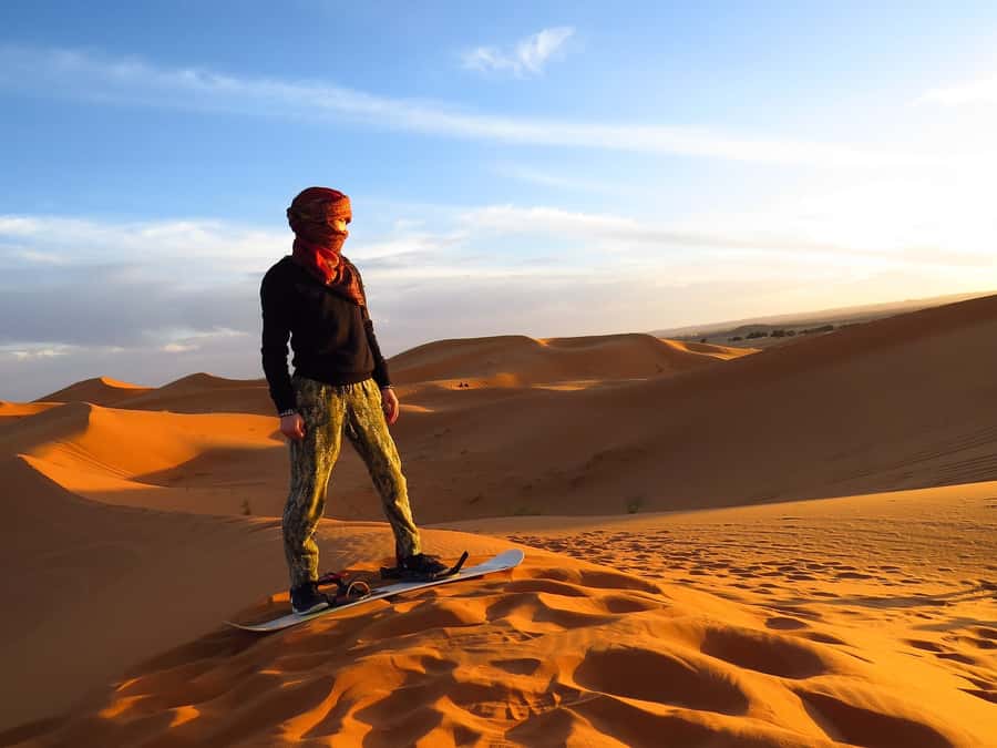 Dubai: Evening Tour with Quad Biking, Camel Ride, and BBQ - Quad biking across the dunes