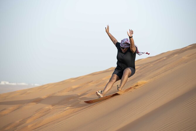 Dubai Half-day Red Dunes bashing with Sandboarding, Camel &Falcon - Transport, timing, and group size