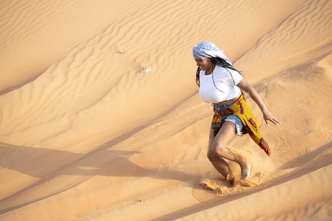 Dubai Half-day Red Dunes bashing with Sandboarding, Camel &Falcon - Dune bashing for 30 to 40 minutes