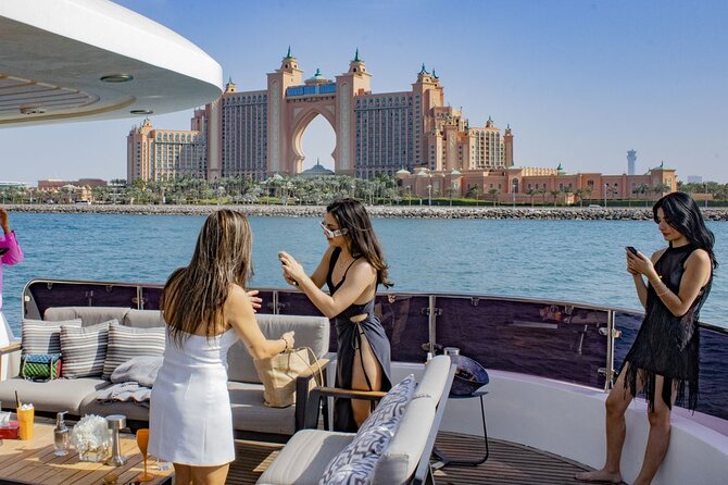 Dubai Harbour Super Yacht Experience with gourmet & Drinks - Music, swimming, and the onboard atmosphere