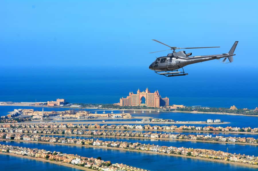 Dubai: Helicopter Ride, Desert Safari, Camels & Refreshments - Optional quad biking across the red dunes