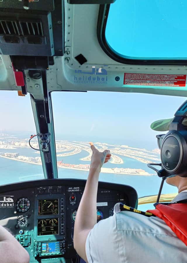 Dubai: Helicopter Ride, Old Town Walking Tour, Abra & Snacks - The 12-minute helicopter view of Dubai