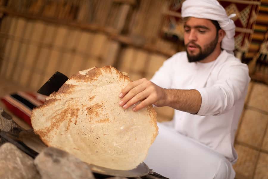 Dubai: Heritage Camel Desert Safari with Traditional Dinner - Transfers, timing, and group comfort