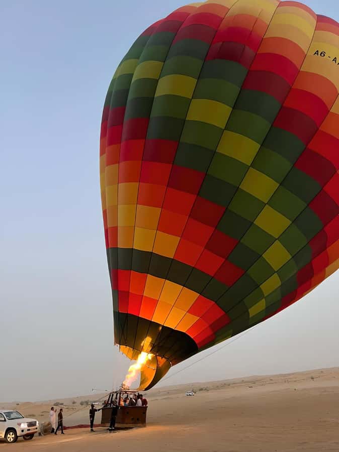 Dubai: Hot Air Balloon, Camel Ride, Desert Safari & More - Sunrise from a hot-air balloon