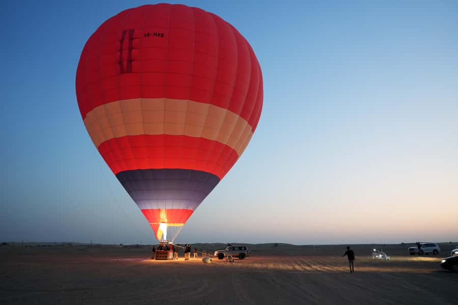 Dubai: Hot Air Balloon Ride with Camel Ride & Falcon Show - Timing, weather, and group size