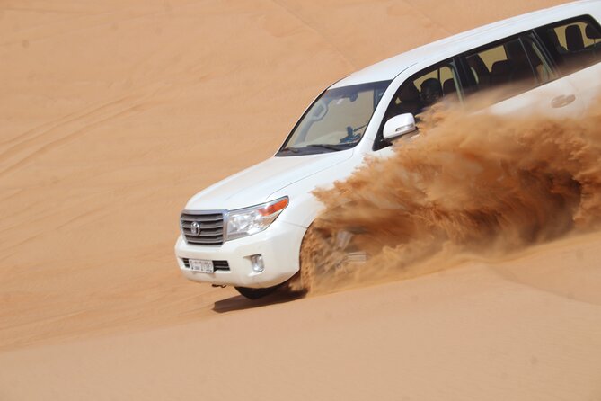 Dubai: Jeep Desert Safari, Camel Ride, and Quad Bike Tour - The camp option can turn activities into an evening outing