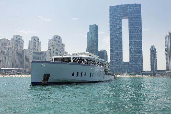 Dubai: Lotus Mega Yacht 3-Hours Dinner Cruise Tour - Live entertainment and several onboard zones