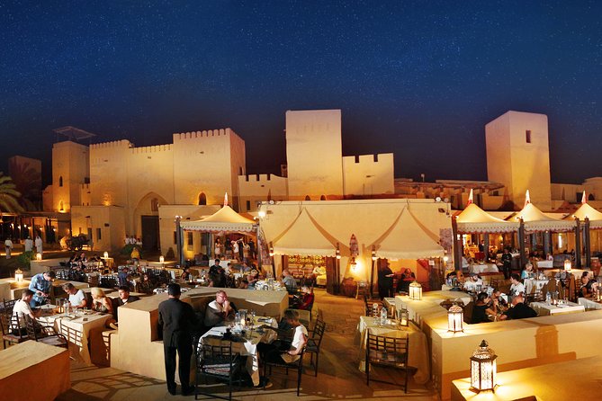 Dubai: Luxury Desert Fortress Dinner, Camel Ride & Live Shows - Arrival with coffee, dates, and frankincense