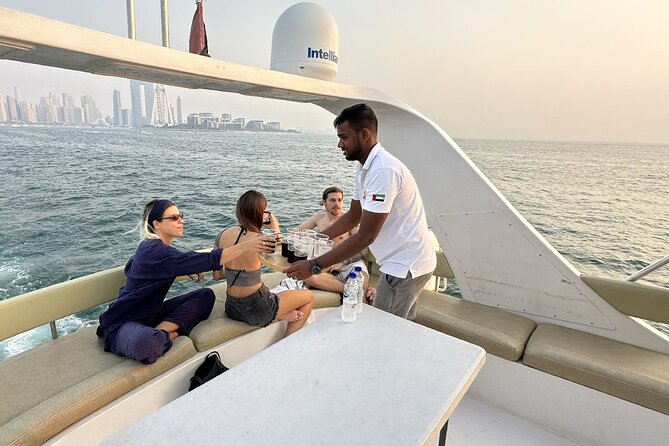 Dubai Marina 2 Hour Sunset Yacht Tour with Alcoholic Drinks - Jumeirah Beach Residence shows Dubai at full height