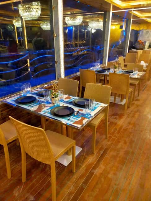 Dubai Marina Dhow Cruise: Dinner Buffet & Live Entertainment - Tanoura, belly dance, and music on board