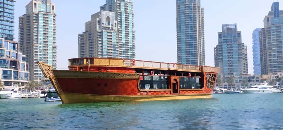 Dubai Marina: Dinner Cruise in a Traditional Boat - Boarding the Ocean Empress behind Silverene Tower