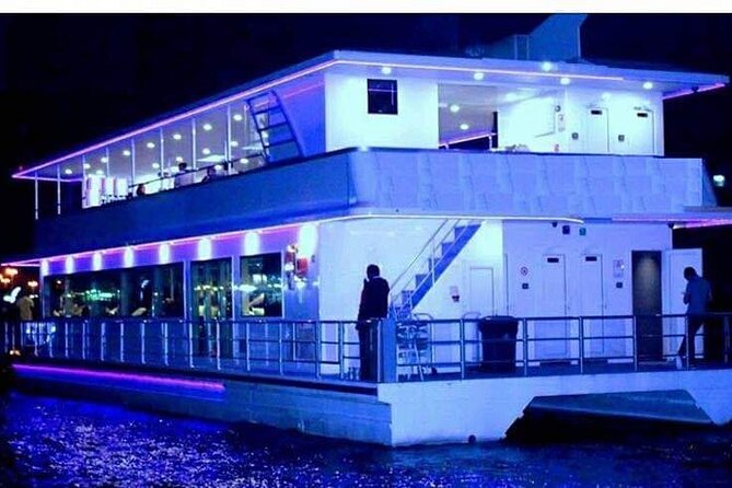 Dubai Marina Dinner Cruise with Live Shows - Open-air views versus air-conditioned comfort