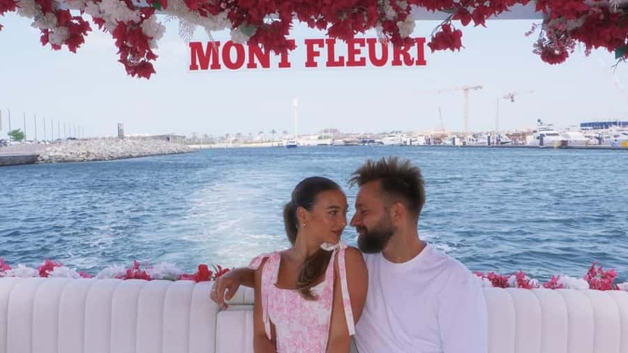 Dubai Marina: Private Boat Tour with Flower - Cruising the Marina canal beneath the towers