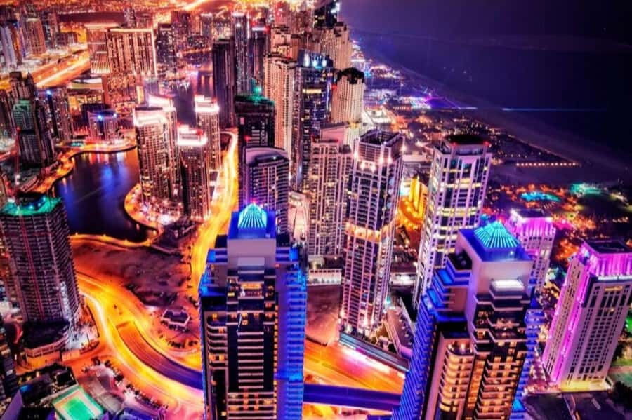 Dubai: Nighttime Guided City Tour by Van & Blue Water Island - Palm Jumeirah from the road