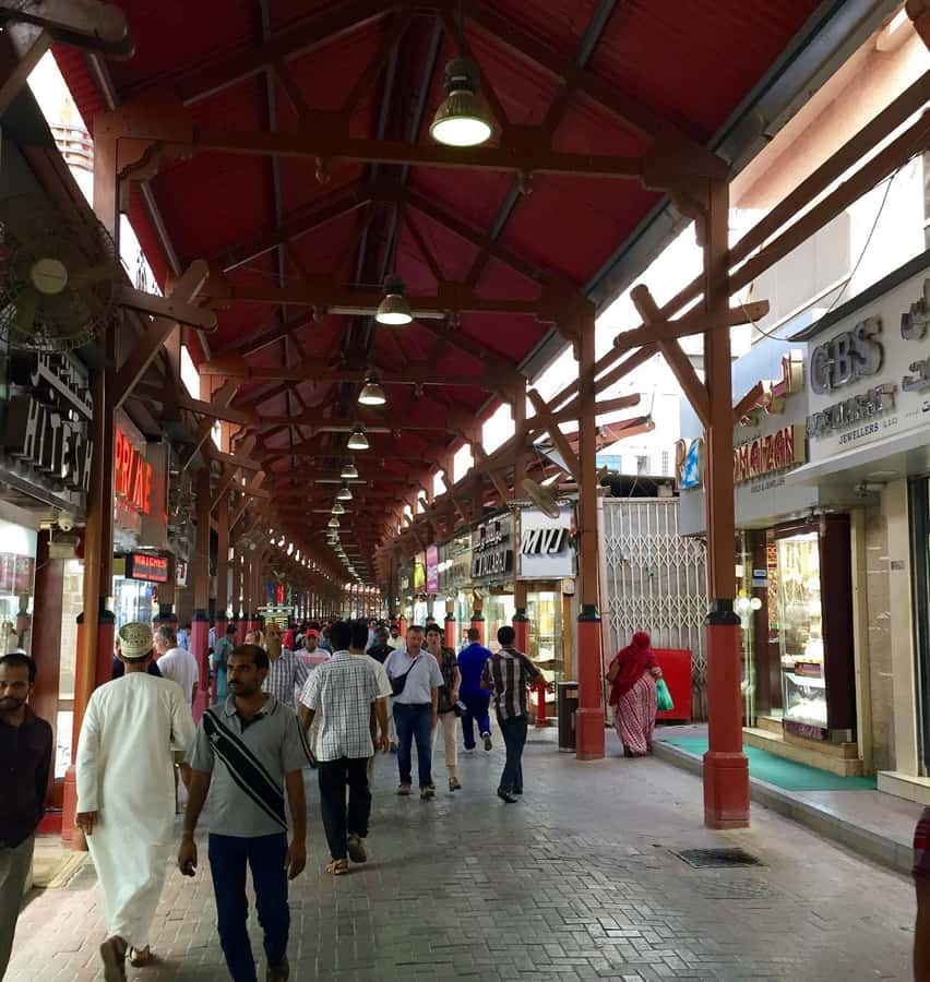 Dubai: Old City Walking Tour with Abra Ride - Al Fahidi Fort and the Old Textile Market