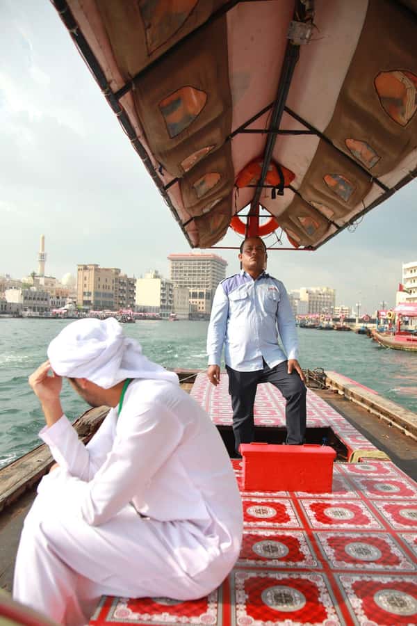 Dubai: Old City Walking Tour with Abra Ride - Gold Souk and the end near Al Ras Metro