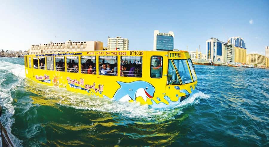 Dubai: Old town tour with Wonder Bus, souks, Creek and Guide - Textile Market, Heritage Village, and the old waterfront