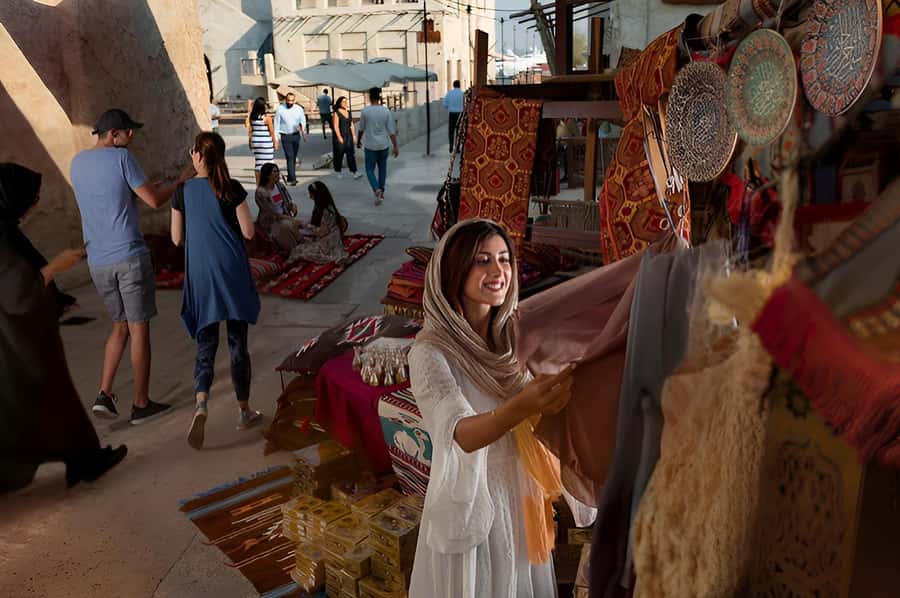 Dubai: Old Town Walking Tour with Abra Cruise & Street Food - Crossing Dubai Creek by traditional abra