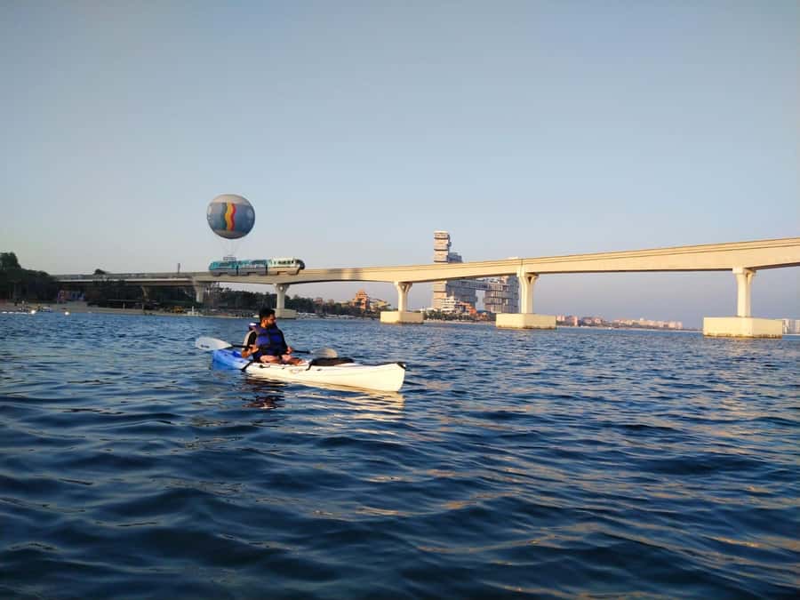 Dubai: Palm Jumeirah Guided Kayaking Tour - The beach stop with Dubai Marina views
