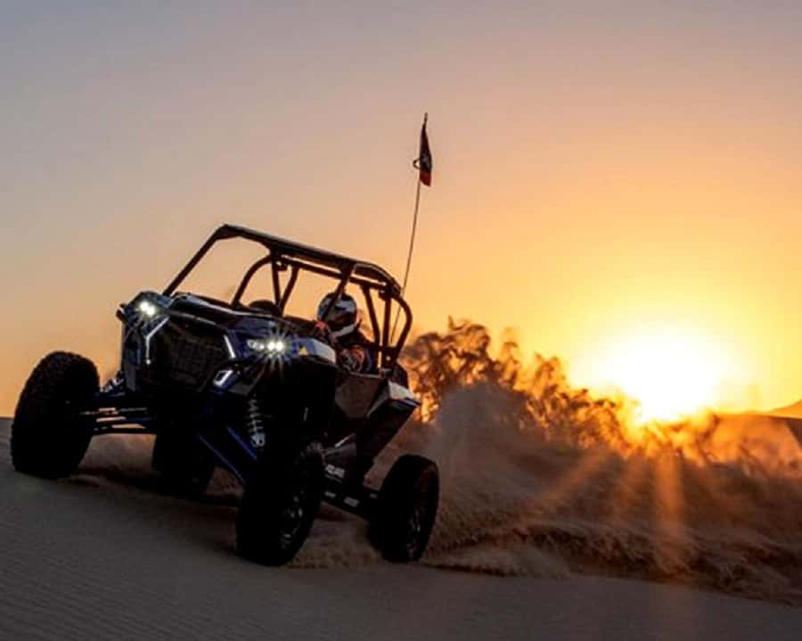 Dubai: Polaris RZR and Sandboarding Desert Adventure - Taking control of the Polaris RZR
