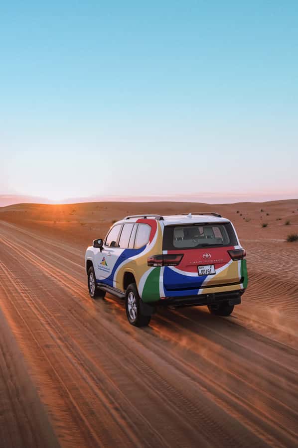 Dubai: Premium Desert Safari, Camel Ride, BBQ & Sandboarding - Leaving Dubai for the red dunes