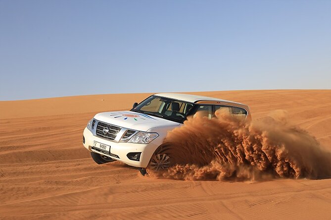 Dubai Premium Desert Safari with Live shows & Gourmet Dinner - Lahbab’s red dunes set the tone