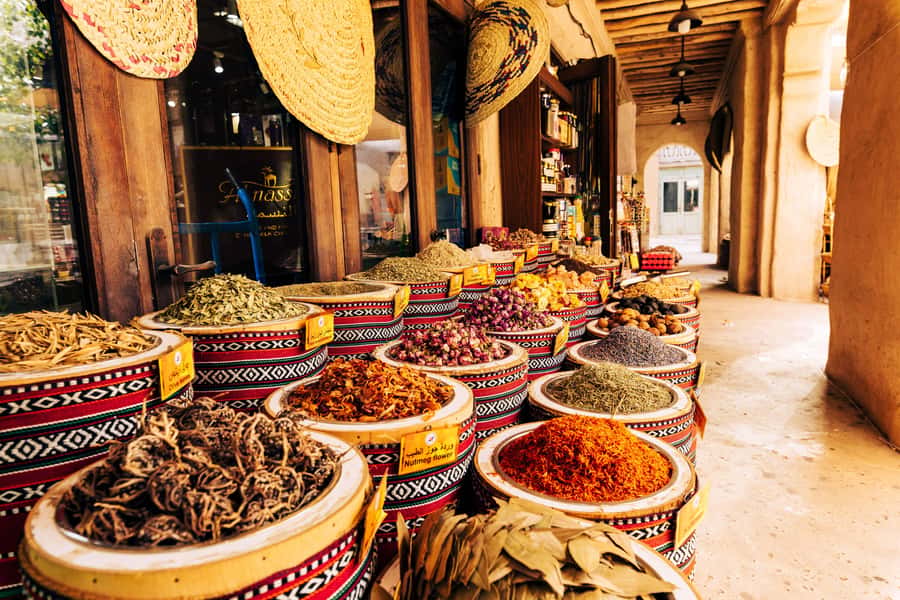 Dubai: Premium Old Town, Street Food, Souks & Boat Ride Tour - Walking the wind towers of Al Fahidi